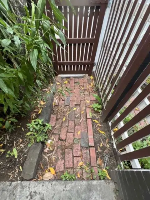 Brick path relaid: photo 1 of 3
