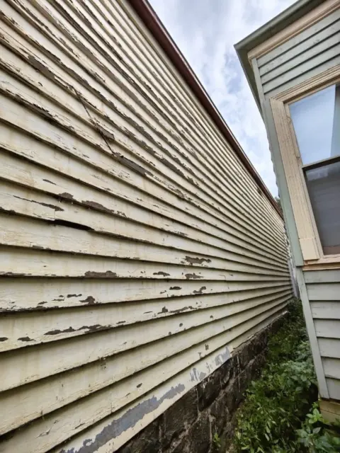 Weatherboards replaced: photo 1 of 2